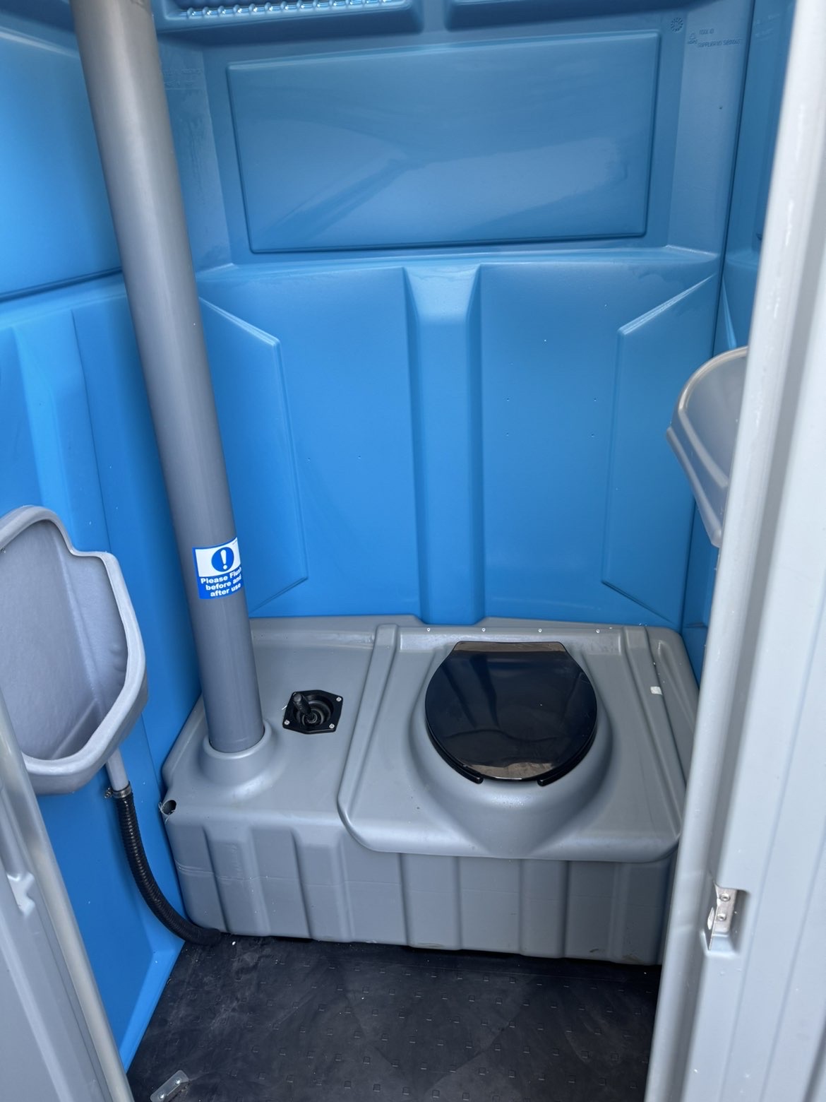 Portable toilet hire interior — well-maintained unit from 1 & 2's Loo Hire, South Oxfordshire